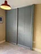 2 door, fjord green sliding wardrobe with twin shaker design, fitted in Barnard Castle (angled photo)